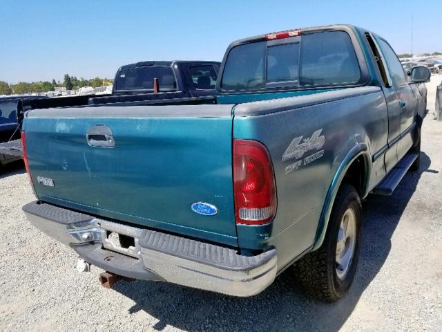 1FTDX1861VKA01276 - 1997 FORD F150 GREEN photo 4