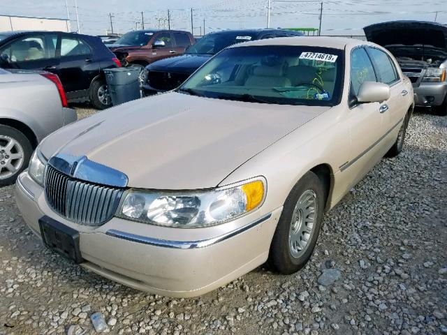 1LNHM83WX1Y644741 - 2001 LINCOLN TOWN CAR C TAN photo 2