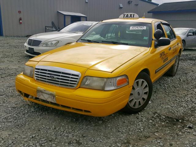 2FABP7BVXAX105725 - 2010 FORD CROWN VICT YELLOW photo 2