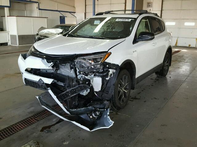 JTMJJREVXJD225336 - 2018 TOYOTA RAV4 HV SE WHITE photo 2