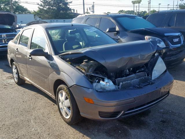 1FAFP34NX5W312950 - 2005 FORD FOCUS ZX4 GRAY photo 1