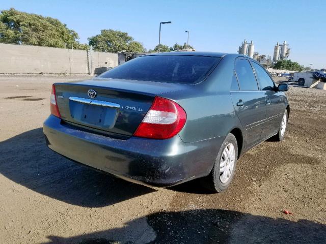 JTDBE32K320091813 - 2002 TOYOTA CAMRY LE GREEN photo 4