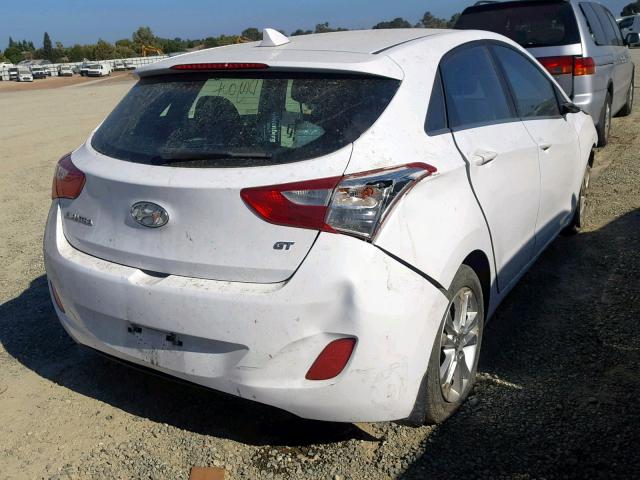 KMHD35LE7DU027851 - 2013 HYUNDAI ELANTRA GT WHITE photo 4