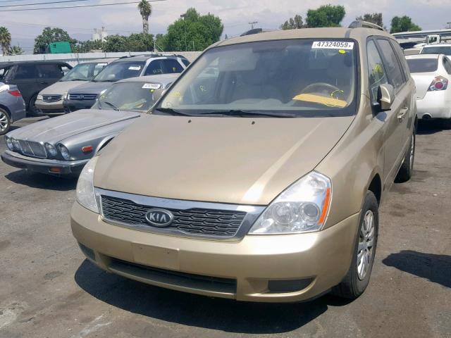 KNDMG4C75B6384628 - 2011 KIA SEDONA LX GOLD photo 2