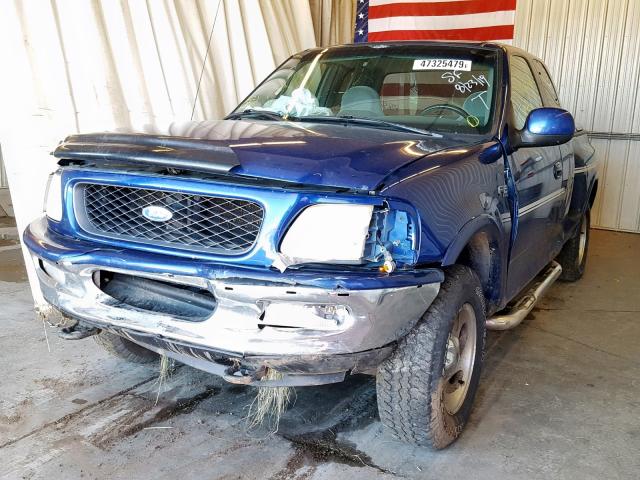 1FTDX08WXVKD57106 - 1997 FORD F150 BLUE photo 2