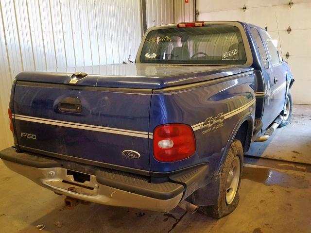1FTDX08WXVKD57106 - 1997 FORD F150 BLUE photo 4