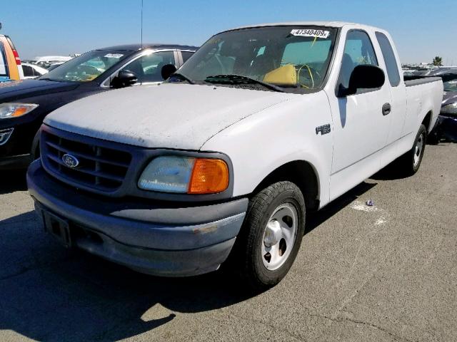 2FTRX17254CA91247 - 2004 FORD F-150 HERI WHITE photo 2