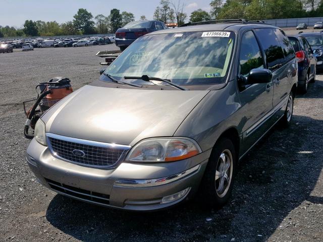 2FMDA56442BB85107 - 2002 FORD WINDSTAR S GOLD photo 2