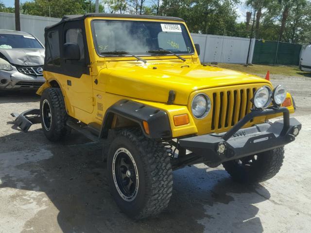 1J4FA29144P770580 - 2004 JEEP WRANGLER / YELLOW photo 1