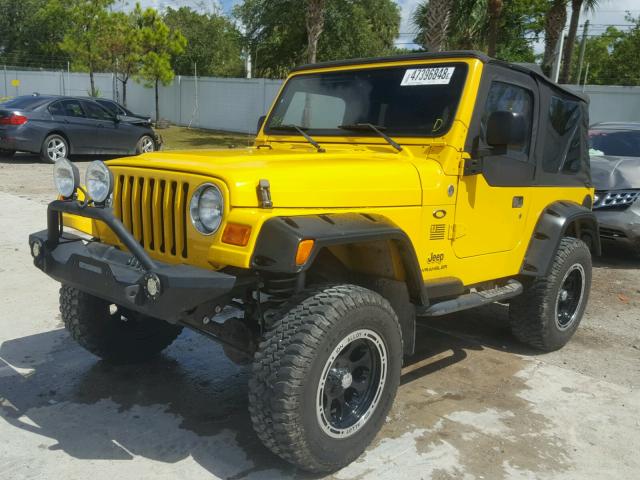 1J4FA29144P770580 - 2004 JEEP WRANGLER / YELLOW photo 2