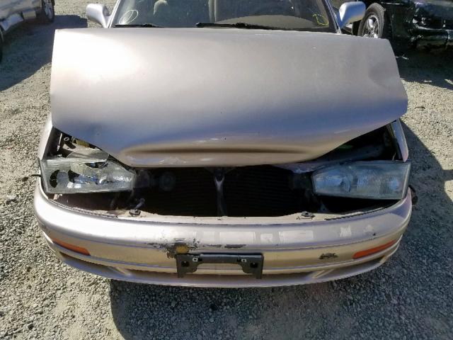 JT2GK12EXR0032564 - 1994 TOYOTA CAMRY LE GOLD photo 7
