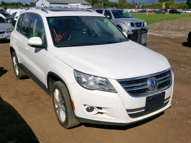 WVGAV7AX8BW525653 - 2011 VOLKSWAGEN TIGUAN S WHITE photo 1