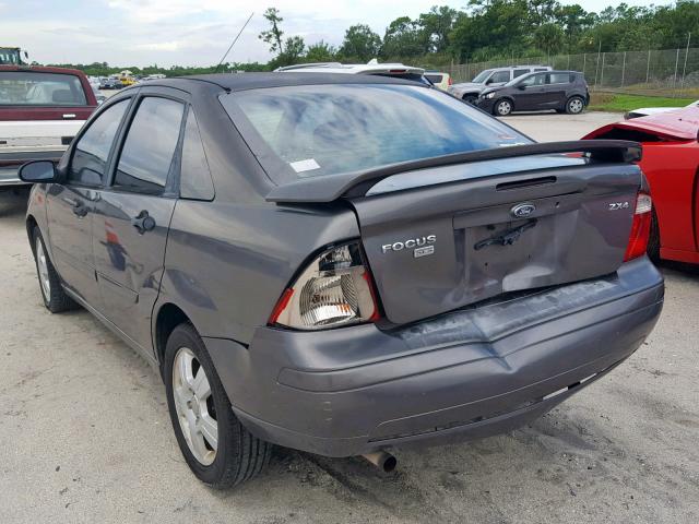 1FAHP34N75W299924 - 2005 FORD FOCUS ZX4 GRAY photo 3