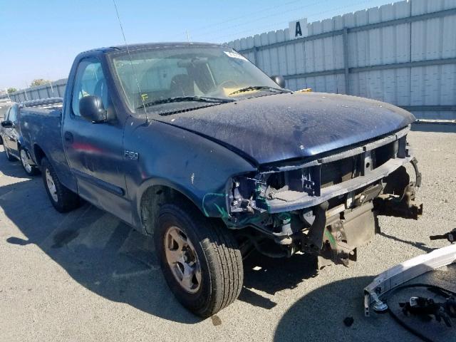 2FTRF17294CA77810 - 2004 FORD F-150 HERI BLUE photo 1