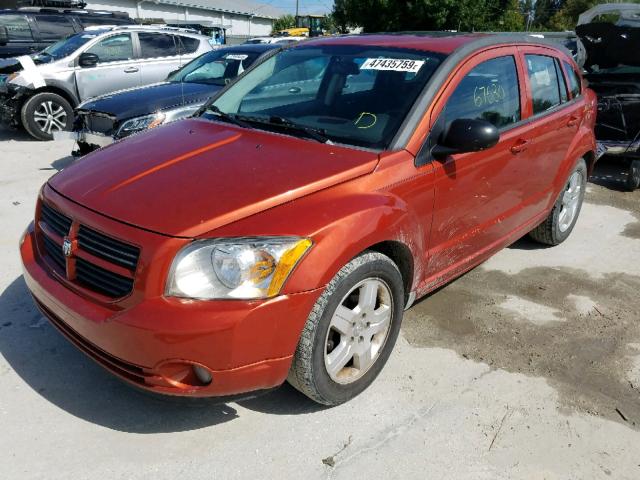 1B3HB48A09D163031 - 2009 DODGE CALIBER SX ORANGE photo 2