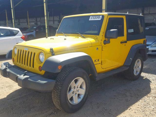 1J4FA24109L752051 - 2009 JEEP WRANGLER X YELLOW photo 2