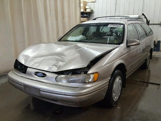 1FALP5741RG249416 - 1994 FORD TAURUS GL TAN photo 2