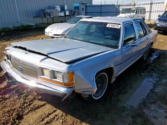 2FABP74F0KX224942 - 1989 FORD CROWN VICT SILVER photo 2