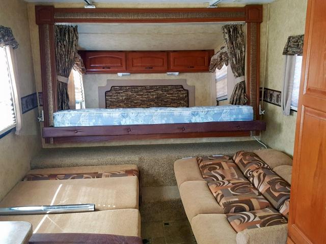 4YDT210239B451467 - 2009 KEYSTONE OUTBACK WHITE photo 6