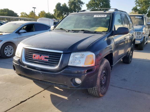 1GKDT13SX42354683 - 2004 GMC ENVOY BLACK photo 2