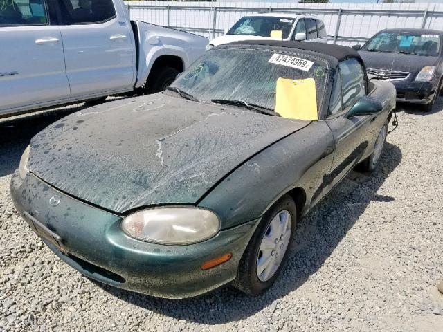 JM1NB3538X0107196 - 1999 MAZDA MX-5 MIATA GREEN photo 2