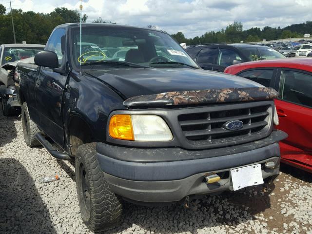 2FTRF18224CA55162 - 2004 FORD F-150 HERI BLACK photo 1