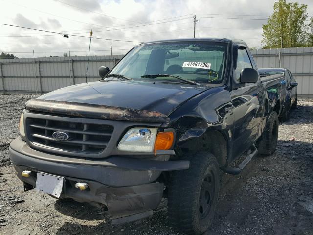 2FTRF18224CA55162 - 2004 FORD F-150 HERI BLACK photo 2