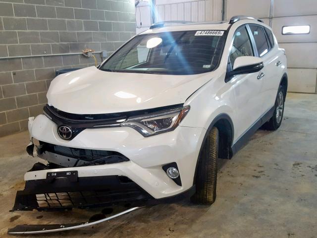 JTMDFREV6HJ713967 - 2017 TOYOTA RAV4 LIMIT WHITE photo 2