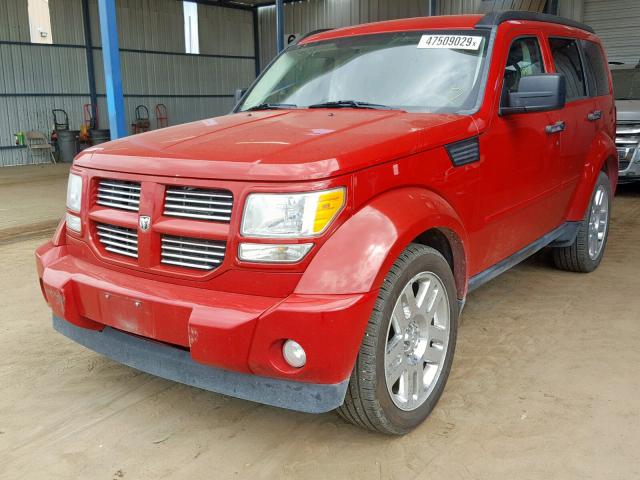 1D4PT4GK1BW604938 - 2011 DODGE NITRO HEAT RED photo 2