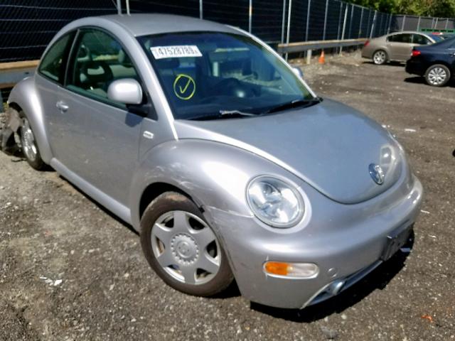 3VWCC21C4XM424942 - 1999 VOLKSWAGEN NEW BEETLE ნაცრისფერი ფოტო 1
