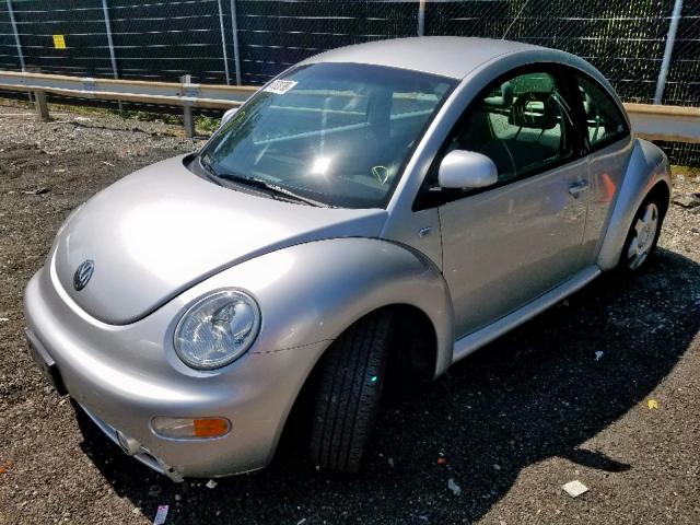 3VWCC21C4XM424942 - 1999 VOLKSWAGEN NEW BEETLE ნაცრისფერი ფოტო 2