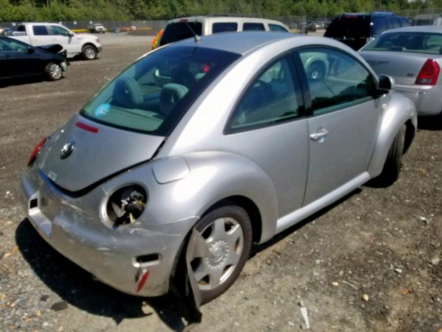 3VWCC21C4XM424942 - 1999 VOLKSWAGEN NEW BEETLE ნაცრისფერი ფოტო 4