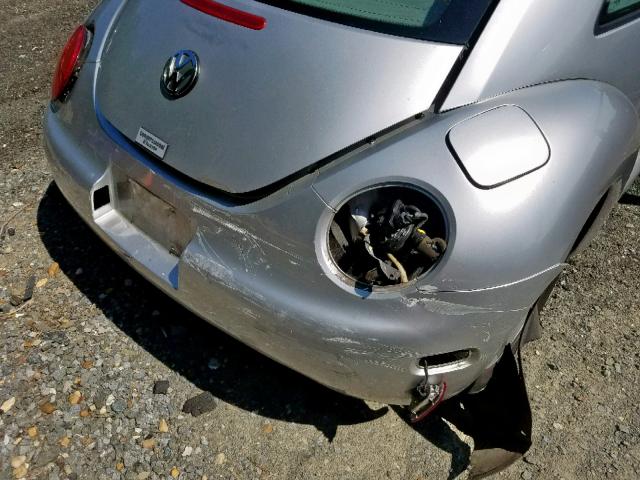 3VWCC21C4XM424942 - 1999 VOLKSWAGEN NEW BEETLE ნაცრისფერი ფოტო 9