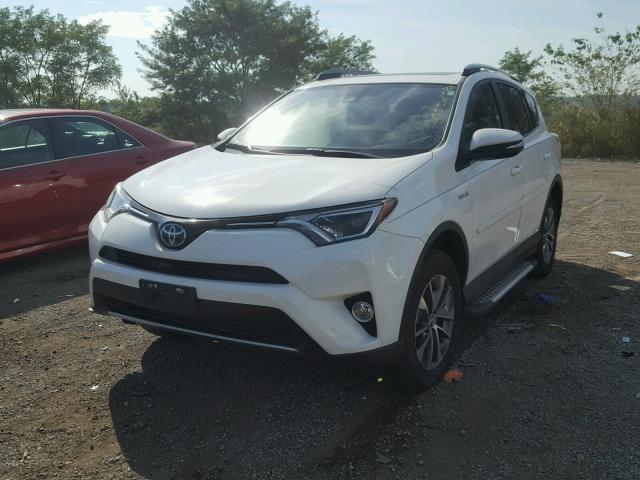 JTMRJREV7HD080477 - 2017 TOYOTA RAV4 HV LE WHITE photo 2