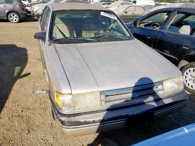 1FAPP37X6KK225860 - 1989 FORD TEMPO LX TAN photo 9