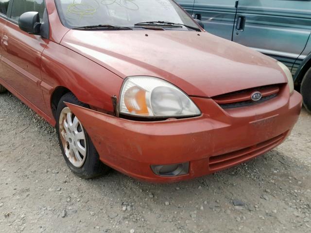 KNADC125036233253 - 2003 KIA RIO RED photo 9