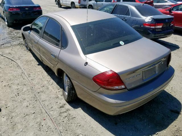 1FAFP55224A200963 - 2004 FORD TAURUS SES GOLD photo 3