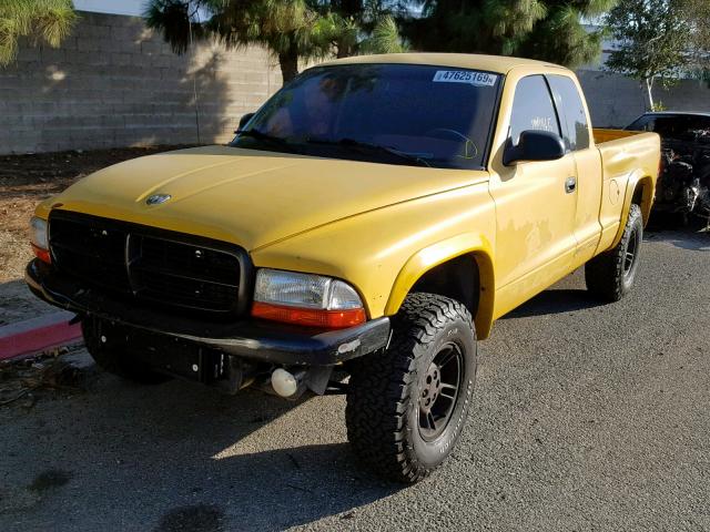 1B7GG22Y3XS175639 - 1999 DODGE DAKOTA YELLOW photo 2