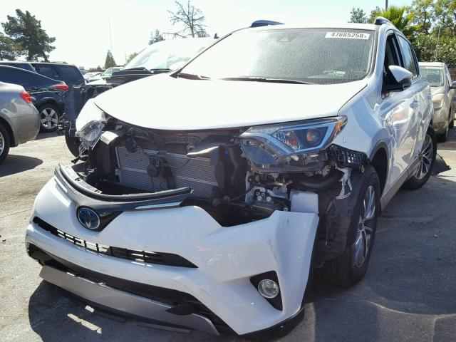 JTMRJREV3HD139492 - 2017 TOYOTA RAV4 HV LE WHITE photo 2