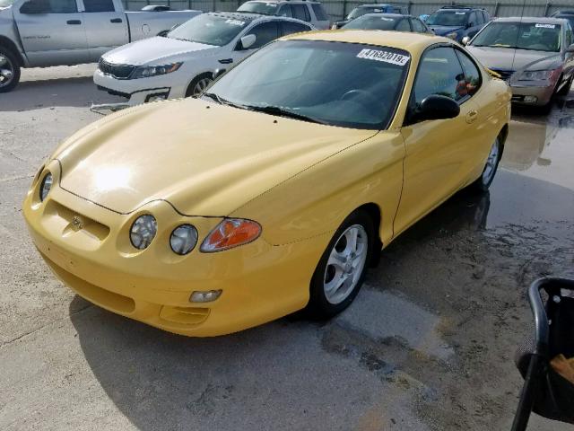 KMHJG25F4YU198459 - 2000 HYUNDAI TIBURON YELLOW photo 2