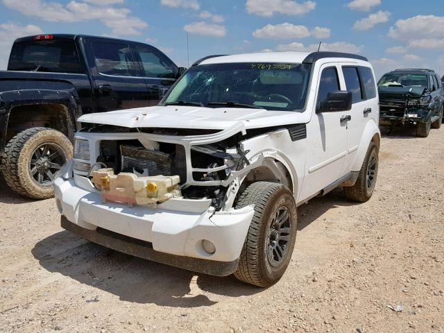 1D4PU4GK6BW602647 - 2011 DODGE NITRO HEAT WHITE photo 2