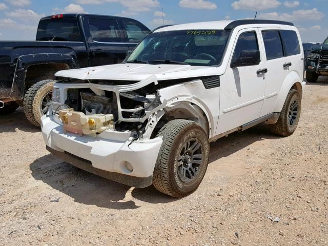 1D4PU4GK6BW602647 - 2011 DODGE NITRO HEAT WHITE photo 9