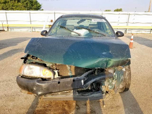 1MEFM13P1XW610878 - 1999 MERCURY TRACER LS GREEN photo 9