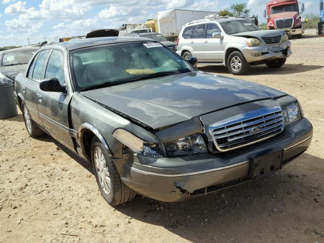 2FAFP74W14X170569 - 2004 FORD CROWN VICT GRAY photo 1