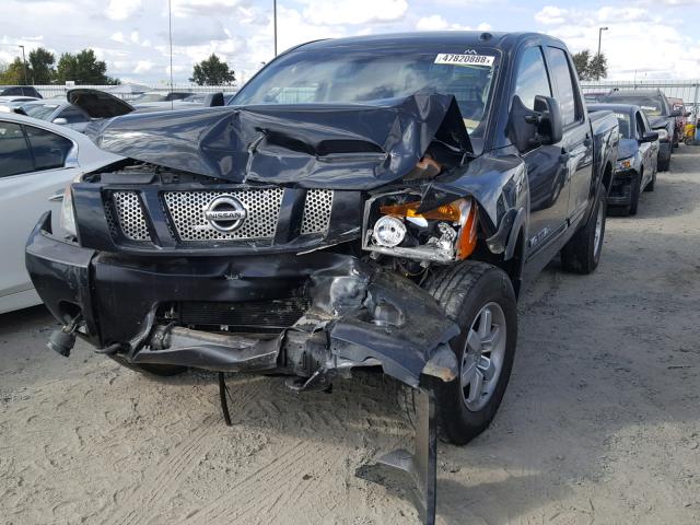 1N6AA0EC7CN300417 - 2012 NISSAN TITAN S BLACK photo 2