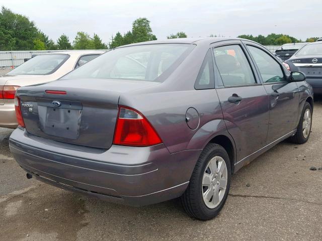 1FAHP34NX7W237453 - 2007 FORD FOCUS ZX4 GRAY photo 4