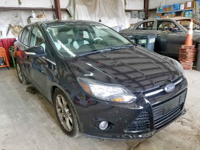 1FAHP3N26CL218883 - 2012 FORD FOCUS TITA BLACK photo 1