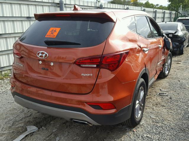 5XYZT3LB6HG490723 - 2017 HYUNDAI SANTA FE S ORANGE photo 4