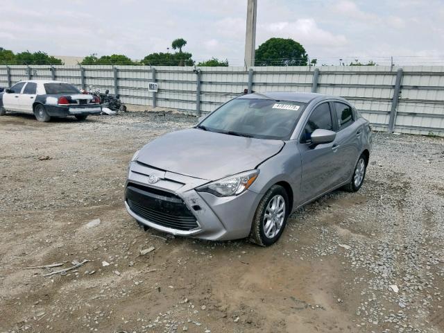 3MYDLBZV7GY139692 - 2016 TOYOTA SCION IA SILVER photo 2