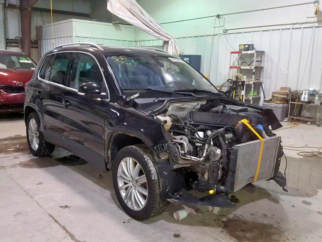 WVGBV7AX1AW527036 - 2010 VOLKSWAGEN TIGUAN SE BLACK photo 1